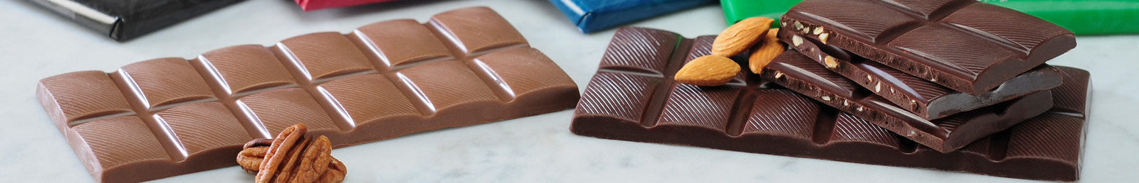 https://www.dilettantemochacafe.com/cdn/shop/collections/Header_Chocolate-Bars_1600x.jpg?v=1682965559