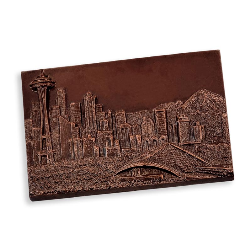 https://www.dilettantemochacafe.com/cdn/shop/files/Seattle-Skyline-Chocolate-Mold_Dark-Chocolate_1600x.jpg?v=1688763099